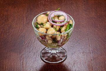 Marinated champignon in the bowl