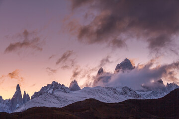 The snow covered mountain range of Cerro Fitzroy in the blue hour just after sunset