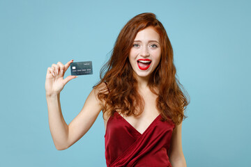 Young caucasian smiling excited happy rich successful ginger readhead curly woman 20s in red party...
