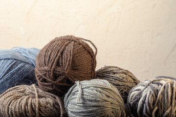 Photo of colored balls from knitting yarn. Knitting supplies close-up. Knitting-women's needlework. 