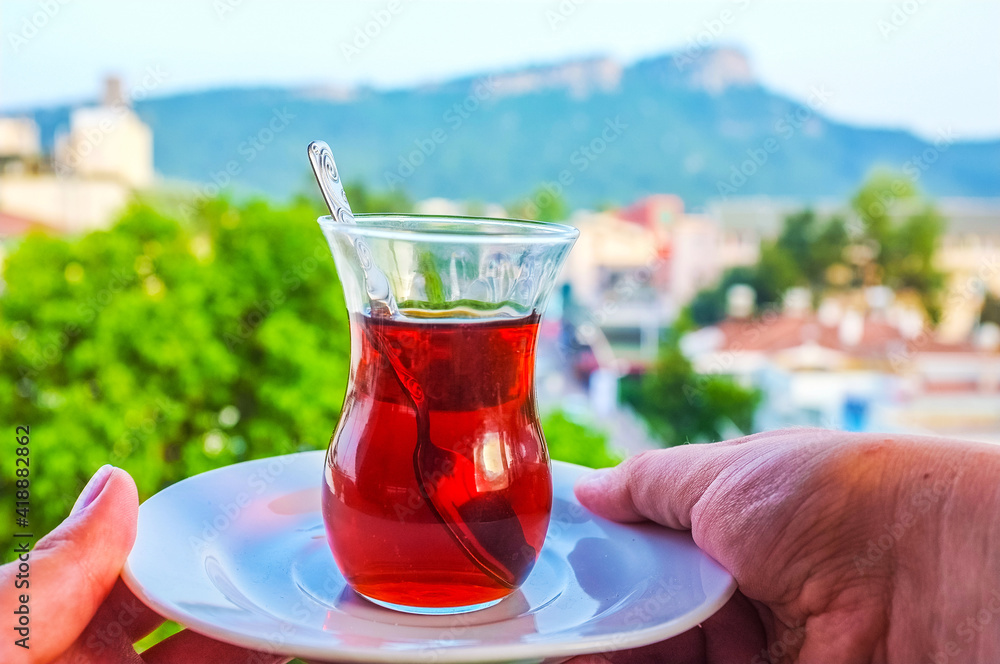 Wall mural Glass of Turkish tea in Kemer, Turkey