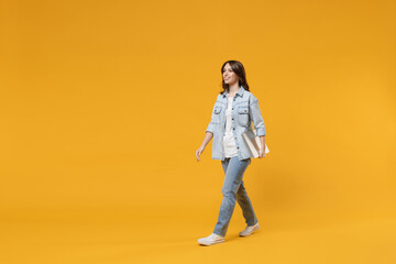 Full length of young freelancer copywriter student happy woman 20s in casual denim shirt white...
