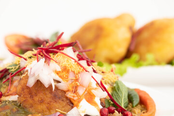 Closeup Of  Masala Chaat Snacks Aloo Tikki Also Known As Alu Ki Tikkia Boiled Mashed Potato Cutlet...