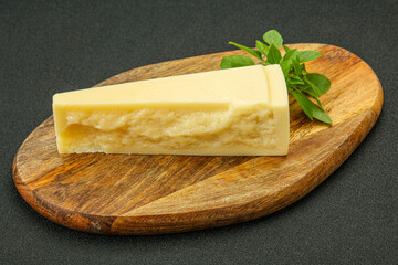 Hard parmesan cheese served basil