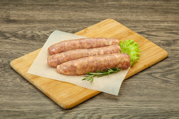 Raw pork meat sausages for grill