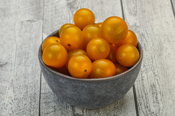 Fresh yellow cherry tomato heap
