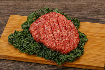 Raw beef burger cutlet for cooking