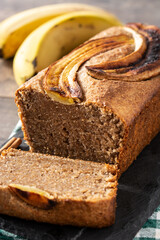 Homemade banana bread on wooden table