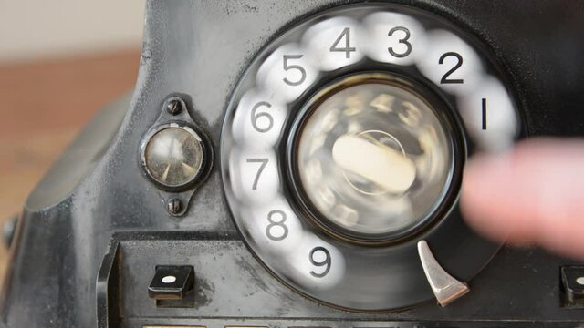 Dailing 611 on an old-fashioned rotary phone 