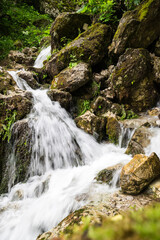 Obraz premium Waterfall in Cherek gorge in the Caucasus mountains in Russia