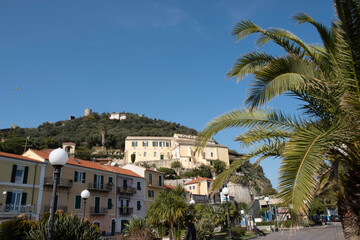 the fortification of the castle of Noli, in the homonymous town of the Ligurian Riviera, on a warm winter day