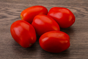 Red bright tasty tomato heap