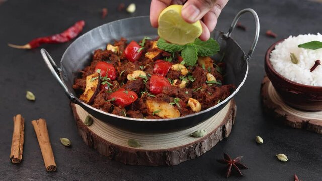  Mutton roast curry , Chukhandar gosht spicy delicious traditional homemade meat beef roast curry 4K slow motion video footage Kerala India Sri Lanka Pakistan made Indian spices coconut pieces cashew 