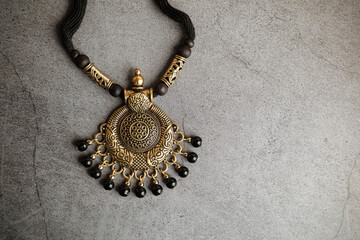 Indian traditional gold necklace with black beads
