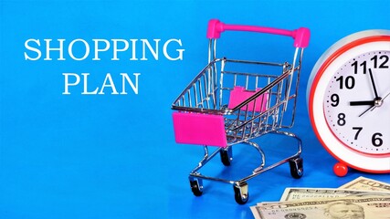 Shopping plan. Text label on the background of a shopping cart and cash. The opportunity to buy a...