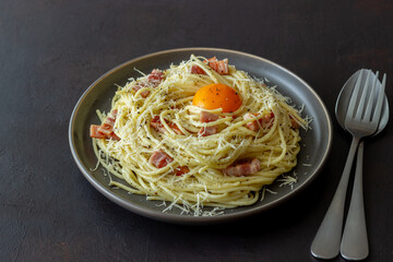 Pasta spaghetti carbonara with egg. Italian cuisine. Recipe. Food.