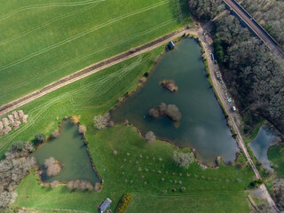 above lakes near tresillian truro cornwall England uk aerial drone