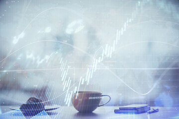 Double exposure of forex chart over coffee cup background in office. Concept of financial analysis and success.