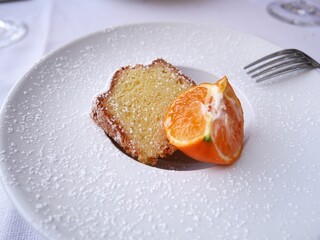 cake with orange on a plate