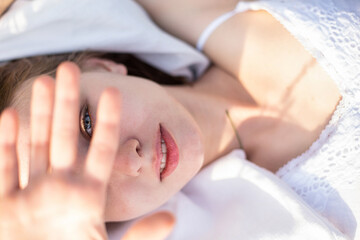 White girl with blonde hair on white