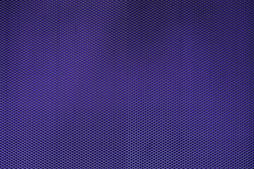 Abstract closeup of metallic background with colour background