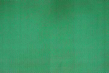 Abstract closeup of metallic background with colour background