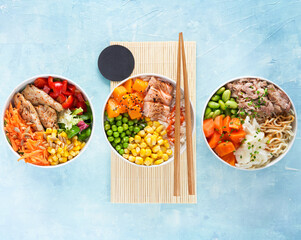 Three Poke bowls flamed salmon, pulled pork, vegan protein alternative heura, rice, noodles,...