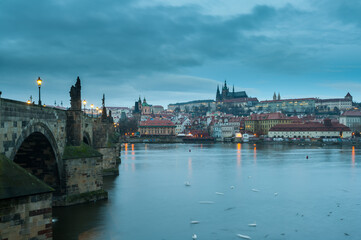 Fototapeta na wymiar View from the Charles bridge in Prague over the Vlatva river at night