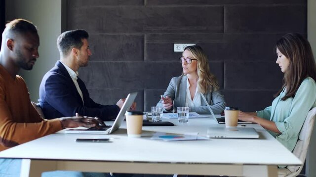 Business partners negotiating in meeting