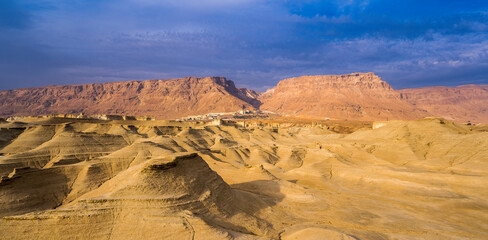 Beautiful desert landscape view towards Masada, ancient Jewish fortress in the Judean desert -...