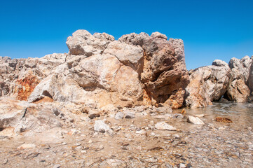 Landscape of beautiful bay with rocky beach in Kos island, Greece