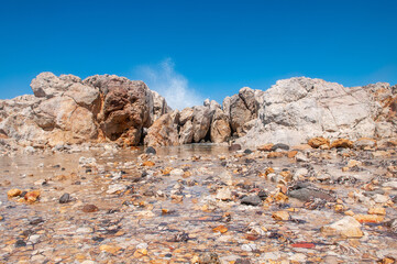 Landscape of beautiful bay with rocky beach in Kos island, Greece