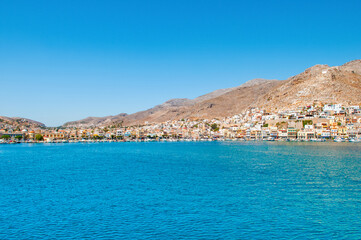 Sunset landscape of the coast and promenade of the island of Kalymnos
