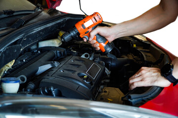 Auto mechanic working in garage. Repair service,Car check concept