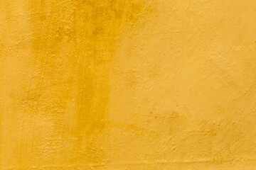 old cracked orange plaster wall