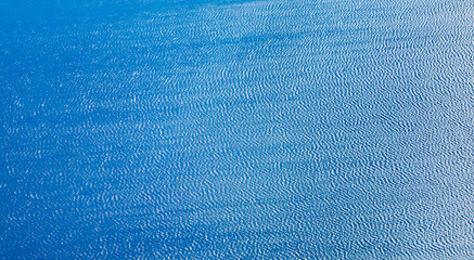 aerial view of ocean with structured waves