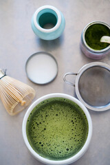 Matcha and whisk flat lay