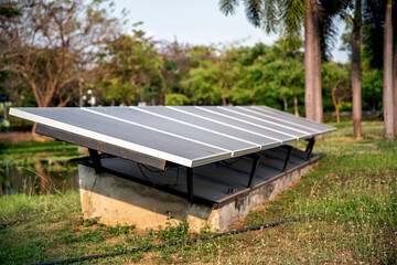 Solar panels (solar cell) in solar farm with blue sky and sun lighting.