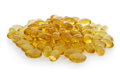 Fish oil in capsules isolated on white background