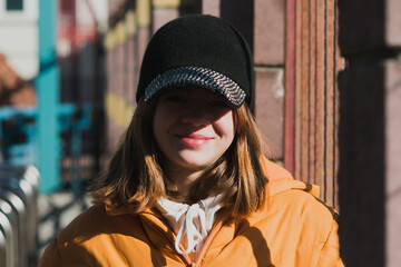 Portrait image of a young girl in the spring sun