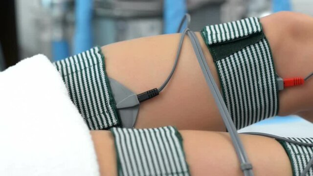 Beautiful Woman getting Electrostimulation Therapy