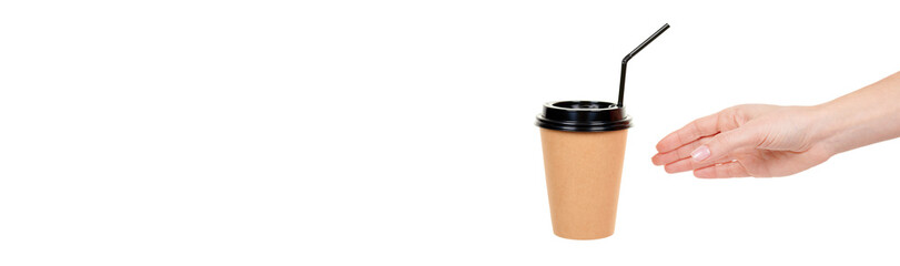 Hand with cardboard cup with black straw isolated on white background.