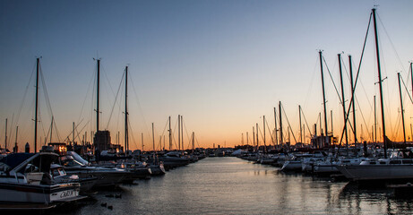 dock boats in a marina in Fells Point in Baltimore City, Maryland.