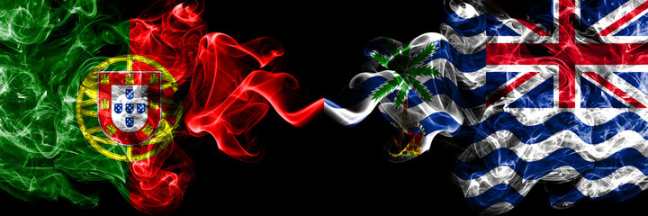 Portugal, Portuguese vs British, Britain, Indian Ocean Territory smoky mystic flags placed side by side. Thick colored silky abstract smoke flags.