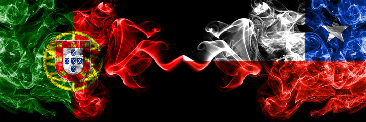 Portugal, Portuguese vs Chile, Chilean smoky mystic flags placed side by side. Thick colored silky abstract smoke flags.