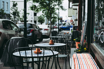 Cozy cafe terrace on the sidewalk in Reykjavik in Iceland