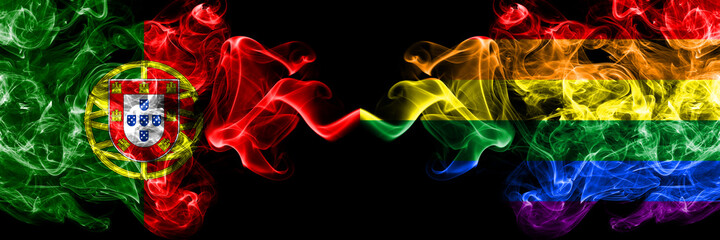 Portugal, Portuguese vs Gay, Pride smoky mystic flags placed side by side. Thick colored silky abstract smoke flags.