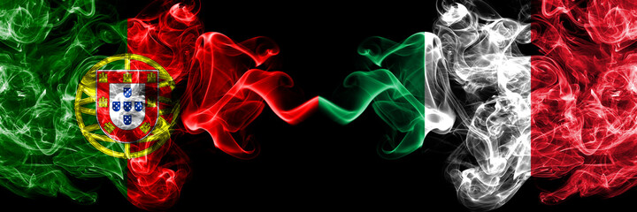 Portugal, Portuguese vs Italy, Italian smoky mystic flags placed side by side. Thick colored silky abstract smoke flags.