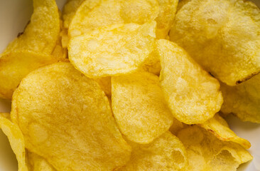 Crispy potato chips. Snacks Fast food or junk food snacks unhealthy concept.
