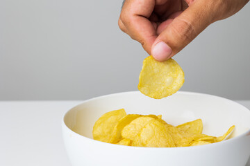 Crispy potato chips. Snacks Fast food or junk food snacks unhealthy concept.